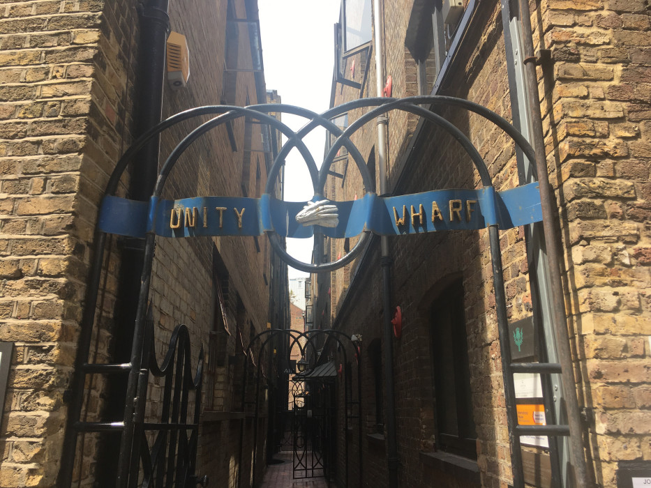 photo of the entrance gate at unity wharf