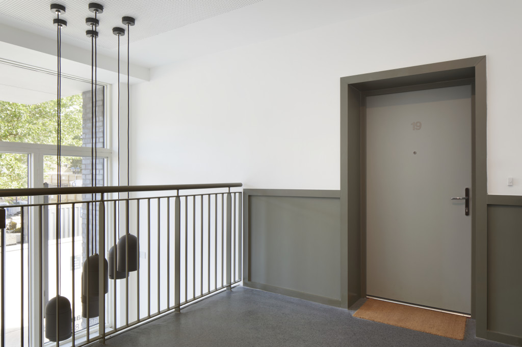 Photo of hallway and stairwell with big windows