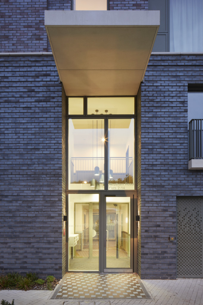 Photograph of the entrance to the new apartment block